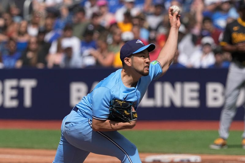 Jun 1, 2024; Toronto, Ontario, CAN;  Toronto Blue Jays starting pitcher Yusei Kikuchi (16) throws against the Pittsburgh Pirates during the second inning at Rogers Centre. Mandatory Credit: John E. Sokolowski-USA TODAY Sports