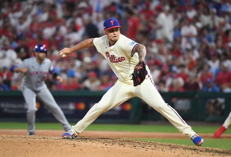 Oct 5, 2024; Philadelphia, PA, USA; Philadelphia Phillies pitcher Orion Kerkering (50) throws a pitch against the New York Mets in the eighth inning in game one of the NLDS for the 2024 MLB Playoffs at Citizens Bank Park. Mandatory Credit: Eric Hartline-Imagn Images