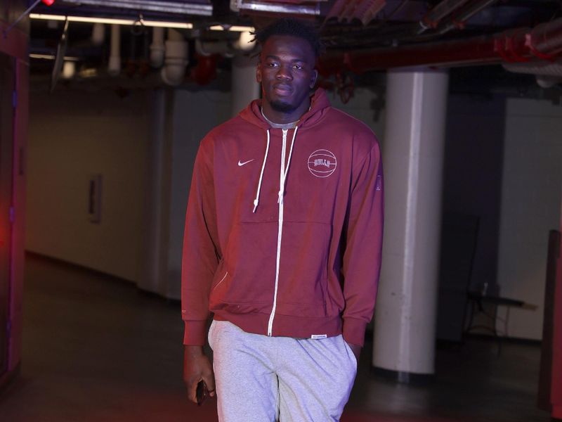 CHICAGO, IL - MARCH 18:  Adama Sanogo #21 of the Chicago Bulls arrives to the arena before the game against the Portland Trail Blazers on March 18, 2024 at United Center in Chicago, Illinois. NOTE TO USER: User expressly acknowledges and agrees that, by downloading and or using this photograph, User is consenting to the terms and conditions of the Getty Images License Agreement. Mandatory Copyright Notice: Copyright 2024 NBAE (Photo by Jeff Haynes/NBAE via Getty Images)