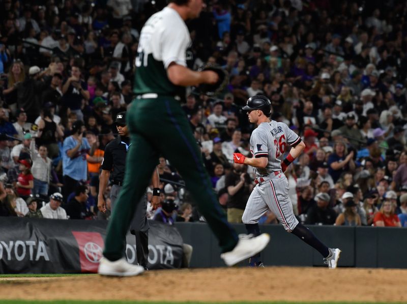 Sep 30, 2023; Denver, Colorado, USA; Minnesota Twins right fielder Max Kepler (26) hits a three run home run off of Colorado Rockies relief pitcher Tommy Doyle (57) in the sixth inning against the Colorado Rockies at Coors Field. Mandatory Credit: John Leyba-USA TODAY Sports