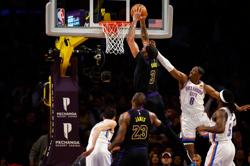 LOS ANGELES, CALIFORNIA - JANUARY 15:  Anthony Davis #3 of the Los Angeles Lakers makes a slam dunk against v8 in the second half at Crypto.com Arena on January 15, 2024 in Los Angeles, California.  NOTE TO USER: User expressly acknowledges and agrees that, by downloading and/or using this photograph, user is consenting to the terms and conditions of the Getty Images License Agreement.  (Photo by Ronald Martinez/Getty Images)