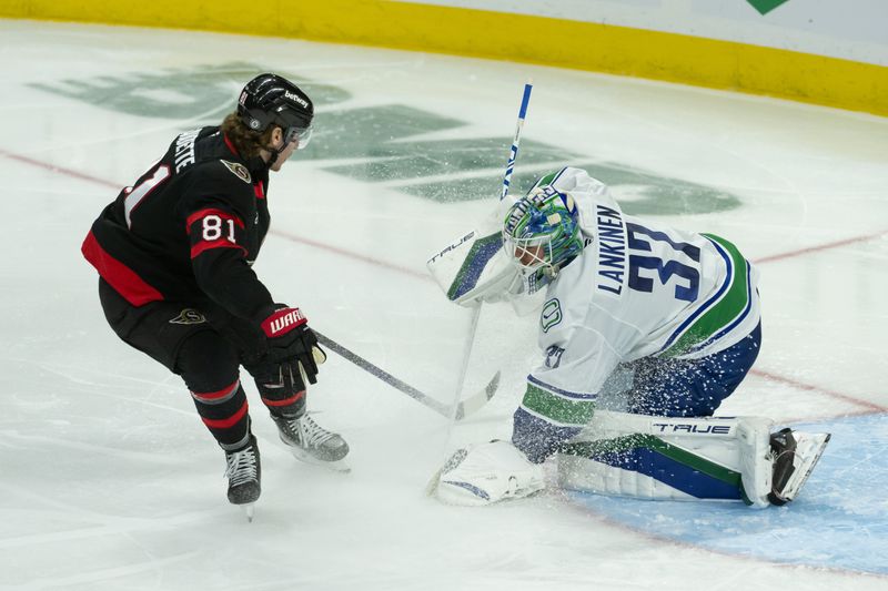 Nov 23, 2024; Ottawa, Ontario, CAN; Vancouver Canucks goalie Kenin Lankinen (32) makes a save in front of Ottawa Senators right wing Adam Gaudette (81) in the third period at the Canadian Tire Centre. Mandatory Credit: Marc DesRosiers-Imagn Images