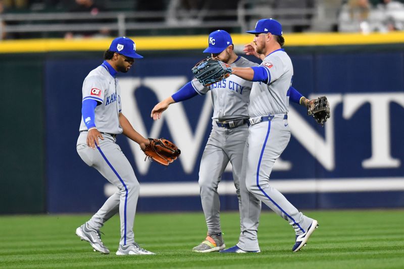 Apr 15, 2024; Chicago, Illinois, USA; (from left to right) Kansas City Royals left fielder MJ Melendez, center fielder Kyle Isbel, and right fielder Hunter Renfroe celebrate after defeating the Chicago White Sox at Guaranteed Rate Field. Mandatory Credit: Patrick Gorski-USA TODAY Sports