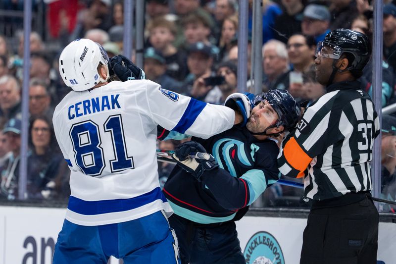 Mar 17, 2026; Seattle, Washington, USA; Seattle Kraken forward Jordan Eberle (7) andTampa Bay Lightning defenseman Erik Cernak (81) scuffle during the second period at Climate Pledge Arena. Mandatory Credit: Stephen Brashear-Imagn Images
