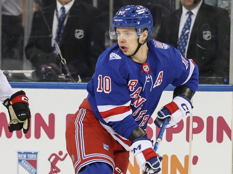 Jan 14, 2026; New York, New York, USA;  New York Rangers left wing Artemi Panarin (10) controls the puck in the first period against the Ottawa Senators at Madison Square Garden. Mandatory Credit: Wendell Cruz-Imagn Images