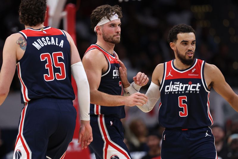 WASHINGTON, DC - OCTOBER 28: Corey Kispert #24 of the Washington Wizards celebrates against the Memphis Grizzlies during the first half at Capital One Arena on October 28, 2023 in Washington, DC. NOTE TO USER: User expressly acknowledges and agrees that, by downloading and or using this photograph, User is consenting to the terms and conditions of the Getty Images License Agreement. (Photo by Patrick Smith/Getty Images)