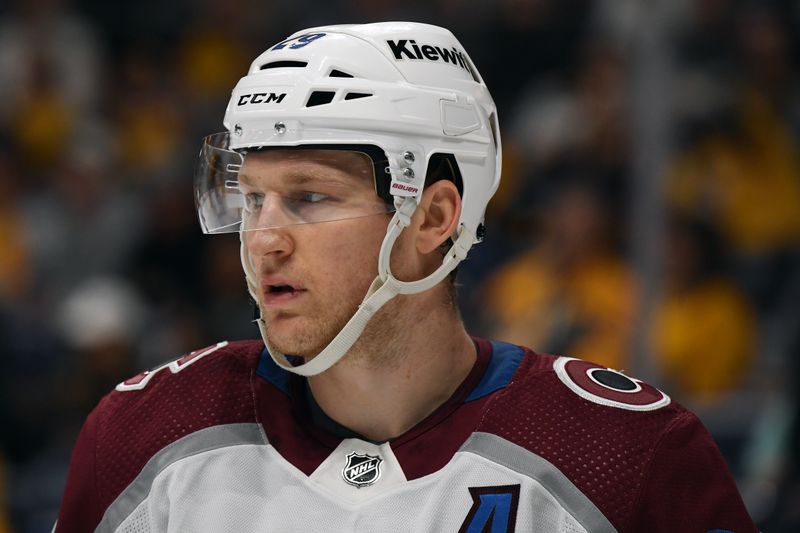 Mar 2, 2024; Nashville, Tennessee, USA; Colorado Avalanche center Nathan MacKinnon (29) waits for a face off during the first period against the Nashville Predators at Bridgestone Arena. Mandatory Credit: Christopher Hanewinckel-USA TODAY Sports