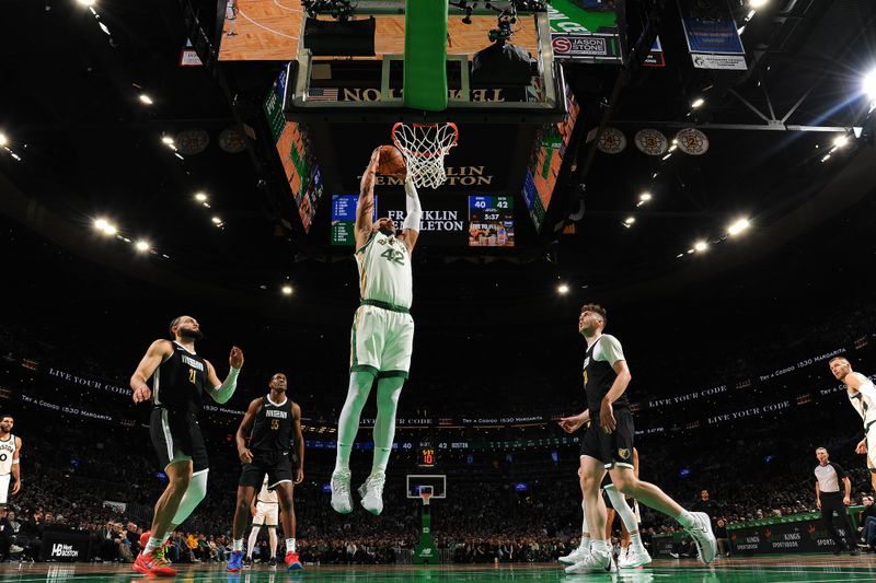 BOSTON, MA - FEBRUARY 4: Al Horford #42 of the Boston Celtics drives to the basket during the game  against the Memphis Grizzlies  on February 4, 2024 at the TD Garden in Boston, Massachusetts. NOTE TO USER: User expressly acknowledges and agrees that, by downloading and or using this photograph, User is consenting to the terms and conditions of the Getty Images License Agreement. Mandatory Copyright Notice: Copyright 2024 NBAE  (Photo by Brian Babineau/NBAE via Getty Images)