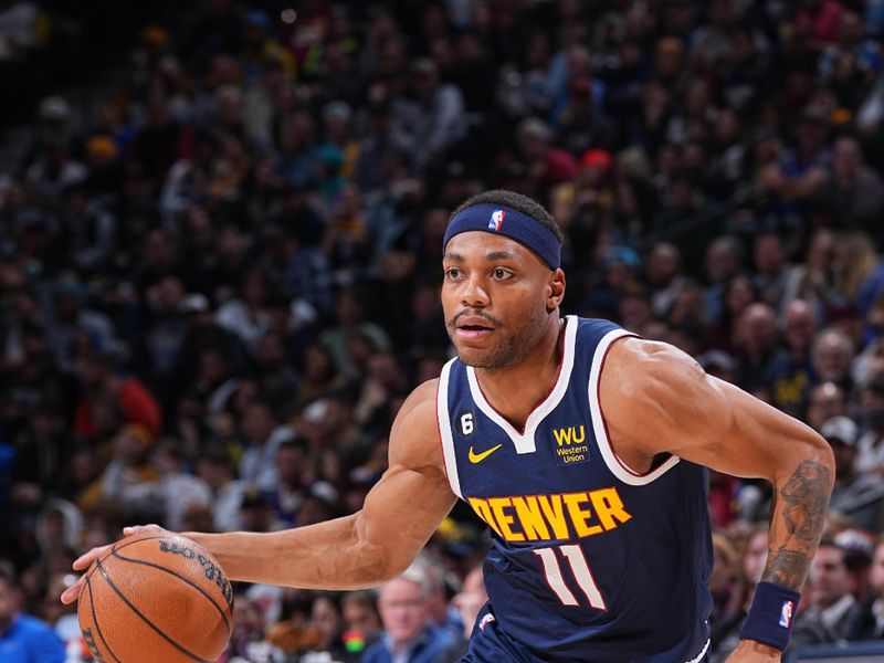 DENVER, CO - JANUARY 17: Bruce Brown #11 of the Denver Nuggets drives to the basket during the game against the Portland Trail Blazers on January 17, 2023 at the Ball Arena in Denver, Colorado. NOTE TO USER: User expressly acknowledges and agrees that, by downloading and/or using this Photograph, user is consenting to the terms and conditions of the Getty Images License Agreement. Mandatory Copyright Notice: Copyright 2023 NBAE (Photo by Bart Young/NBAE via Getty Images)