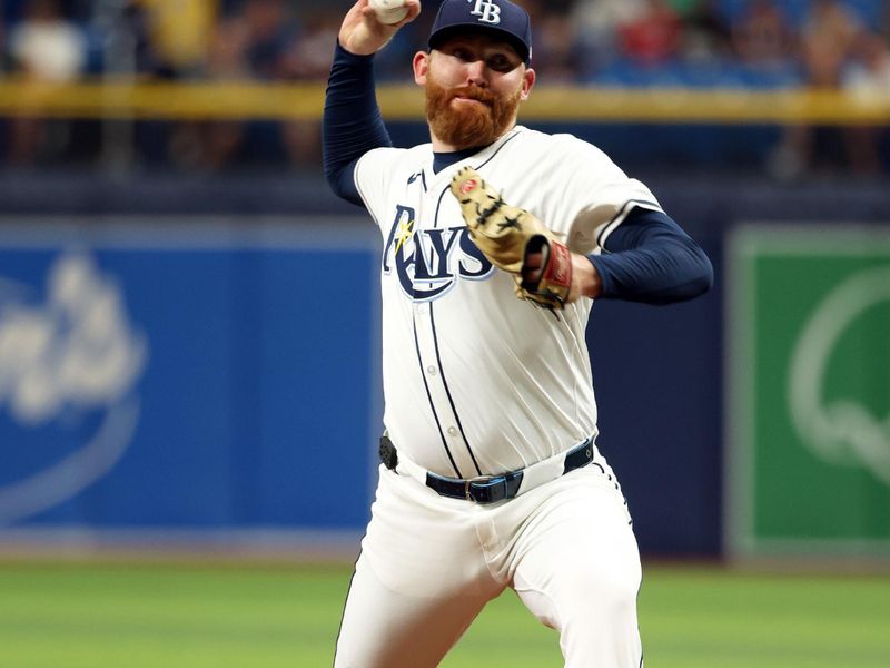 Aug 14, 2024; St. Petersburg, Florida, USA;  Tampa Bay Rays starting pitcher Zack Littell (52) throws a pitch against the Houston Astros during the first inning at Tropicana Field. Mandatory Credit: Kim Klement Neitzel-USA TODAY Sports