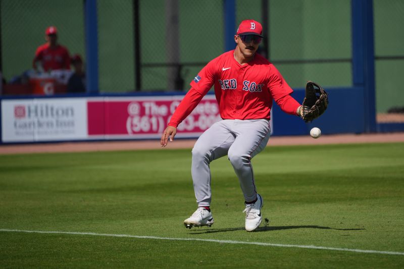 Feb 28, 2024; West Palm Beach, Florida, USA;  Boston Red Sox left fielder Mark Contreras (59) watches a bloop signal drop in for a hit during the third inning at The Ballpark of the Palm Beaches. Mandatory Credit: Jim Rassol-USA TODAY Sports