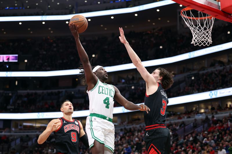 CHICAGO, ILLINOIS - NOVEMBER 29: Jrue Holiday #4 of the Boston Celtics shoots the ball between Nikola Vucevic #9 and Josh Giddey #3 of the Chicago Bulls during the first quarter of the Emirates NBA Cup game at the United Center on November 29, 2024 in Chicago, Illinois. NOTE TO USER: User expressly acknowledges and agrees that, by downloading and or using this photograph, User is consenting to the terms and conditions of the Getty Images License Agreement.  (Photo by Luke Hales/Getty Images)
