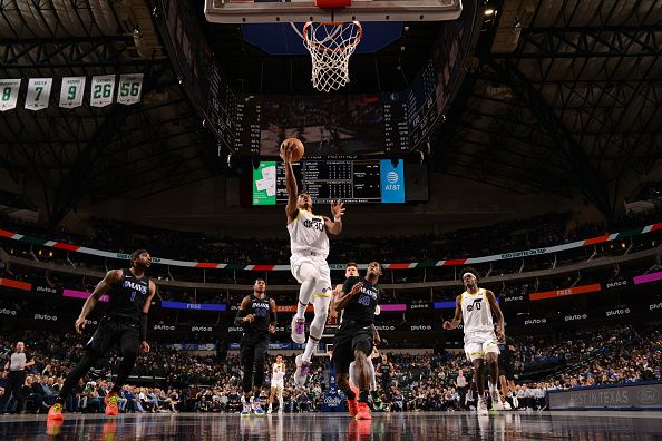 DALLAS, TX - DECEMBER 6 : Ochai Agbaji #30 of the Utah Jazz drives to the basket during the game against the Dallas Mavericks on December 6, 2023 at the American Airlines Center in Dallas, Texas. NOTE TO USER: User expressly acknowledges and agrees that, by downloading and or using this photograph, User is consenting to the terms and conditions of the Getty Images License Agreement. Mandatory Copyright Notice: Copyright 2023 NBAE (Photo by Glenn James/NBAE via Getty Images)