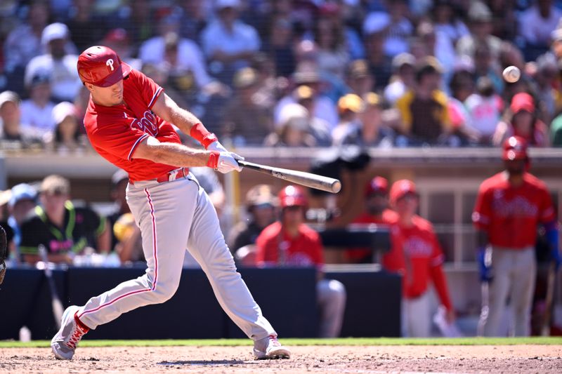 Sep 6, 2023; San Diego, California, USA; Philadelphia Phillies catcher J.T. Realmuto (10) hits a home run against the San Diego Padres during the fifth inning at Petco Park. Mandatory Credit: Orlando Ramirez-USA TODAY Sports