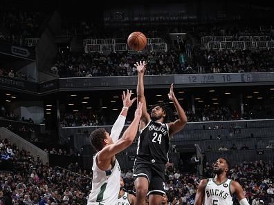 BROOKLYN, NY - DECEMBER 27: Pat Connaughton #24 of the Milwaukee Bucks drives to the basket during the game against the Milwaukee Bucks on December 27, 2023 at Barclays Center in Brooklyn, New York. NOTE TO USER: User expressly acknowledges and agrees that, by downloading and or using this Photograph, user is consenting to the terms and conditions of the Getty Images License Agreement. Mandatory Copyright Notice: Copyright 2023 NBAE (Photo by Jesse D. Garrabrant/NBAE via Getty Images)