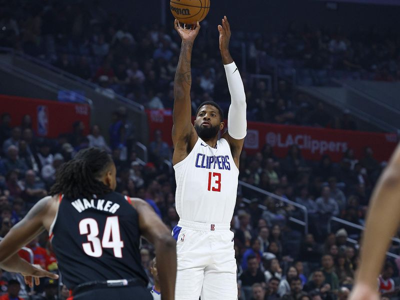 LOS ANGELES, CALIFORNIA - DECEMBER 11:  Paul George #13 of the LA Clippers takes a shot against the Portland Trail Blazers in the first half at Crypto.com Arena on December 11, 2023 in Los Angeles, California.  NOTE TO USER: User expressly acknowledges and agrees that, by downloading and/or using this photograph, user is consenting to the terms and conditions of the Getty Images License Agreement. (Photo by Ronald Martinez/Getty Images)