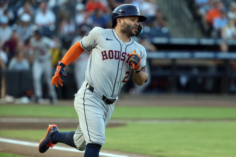 May 20, 2025; St. Petersburg, Florida, USA;Houston Astros outfielder Jose Altuve (27) singles against the Tampa Bay Rays during the third inning at George M. Steinbrenner Field. Mandatory Credit: Kim Klement Neitzel-Imagn Images