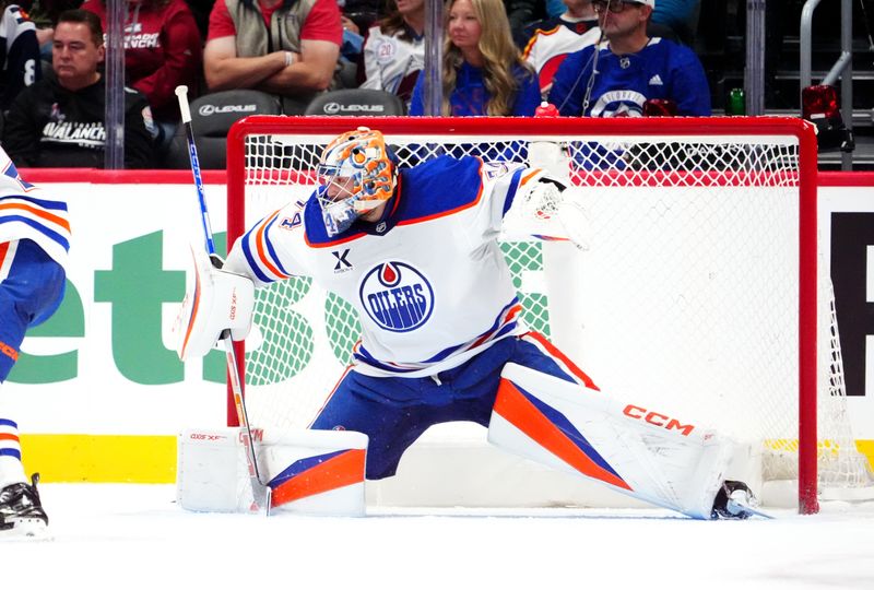 Nov 30, 2024; Denver, Colorado, USA; Edmonton Oilers goaltender Stuart Skinner (74) defends his net in the third period against the Colorado Avalanche at Ball Arena. Mandatory Credit: Ron Chenoy-Imagn Images