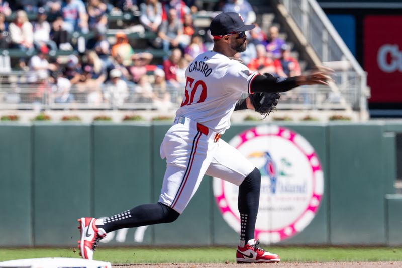 Apr 6, 2024; Minneapolis, Minnesota, USA; Minnesota Twins third base Willi Castro (50) throws out Cleveland Guardians first base Josh Naylor (22) at second base in the second inning at Target Field. Mandatory Credit: Matt Blewett-USA TODAY Sports