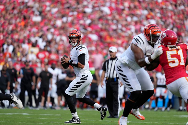 Cincinnati Bengals quarterback Joe Burrow drops back to pass during the first half of an NFL football game against the Kansas City Chiefs Sunday, Sept. 15, 2024, in Kansas City, Mo. (AP Photo/Ed Zurga)