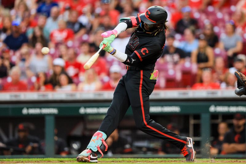 Sep 20, 2024; Cincinnati, Ohio, USA; Cincinnati Reds shortstop Elly De La Cruz (44) hits a single in the third inning against the Pittsburgh Pirates at Great American Ball Park. Mandatory Credit: Katie Stratman-Imagn Images