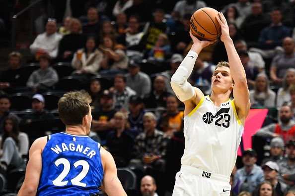 SALT LAKE CITY, UTAH - NOVEMBER 02: Lauri Markkanen #23 of the Utah Jazz shoots over Franz Wagner #22 of the Orlando Magic during a game at Delta Center on November 02, 2023 in Salt Lake City, Utah. NOTE TO USER: User expressly acknowledges and agrees that, by downloading and or using this photograph, User is consenting to the terms and conditions of the Getty Images License Agreement.  (Photo by Alex Goodlett/Getty Images)