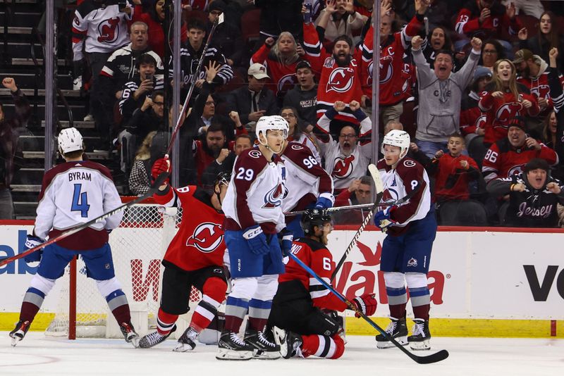 Feb 6, 2024; Newark, New Jersey, USA; New Jersey Devils defenseman John Marino (6) celebrates his goal against the Colorado Avalanche during the third period at Prudential Center. Mandatory Credit: Ed Mulholland-USA TODAY Sports