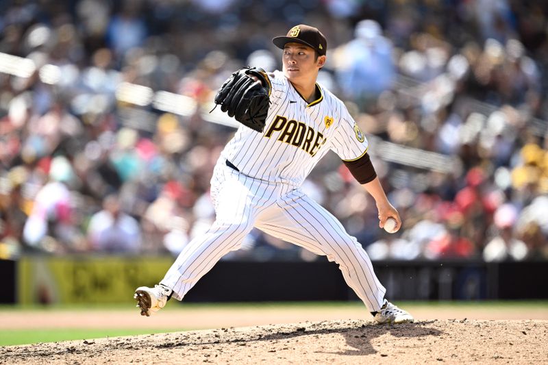 May 1, 2024; San Diego, California, USA; San Diego Padres relief pitcher Yuki Matsui (1) throws a pitch against the Cincinnati Reds during the seventh inning at Petco Park. Mandatory Credit: Orlando Ramirez-USA TODAY Sports