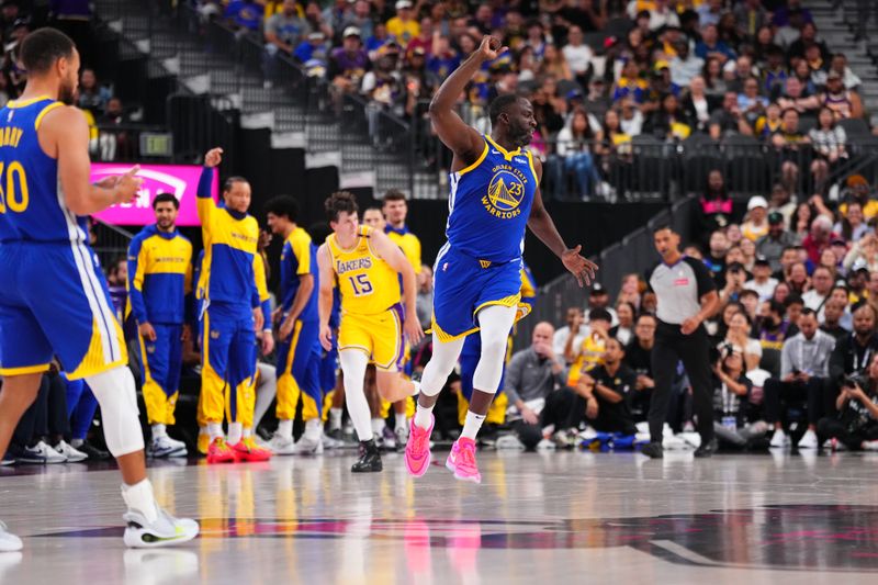 LAS VEGAS, NV - OCTOBER 15: Draymond Green #23 of the Golden State Warriors celebrates during the game against the Los Angeles Lakers during the 2024 NBA Preseason on October 15, 2024 at T-Mobile Arena in Las Vegas, Nevada. NOTE TO USER: User expressly acknowledges and agrees that, by downloading and or using this photograph, User is consenting to the terms and conditions of the Getty Images License Agreement. Mandatory Copyright Notice: Copyright 2024 NBAE  (Photo by Jeff Bottari/NBAE via Getty Images)