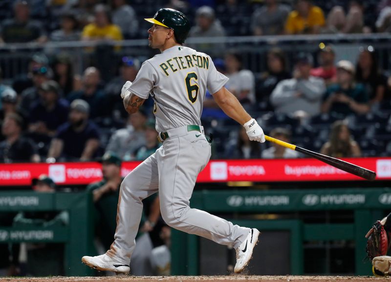 Jun 6, 2023; Pittsburgh, Pennsylvania, USA; Oakland Athletics second baseman Jace Peterson (6) hits his second two run home run of the game against the Pittsburgh Pirates during the ninth inning at PNC Park. Oakland won 11-2. Mandatory Credit: Charles LeClaire-USA TODAY Sports