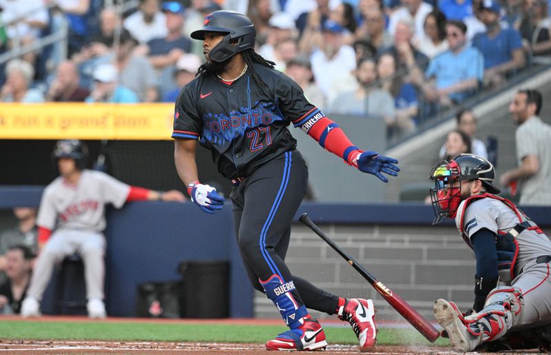 Jun 17, 2024; Toronto, Ontario, CAN;  Toronto Blue Jays first baseman Vladimir Guerrero Jr. (27) hits a single against the Boston Red Sox in the first inning at Rogers Centre. Mandatory Credit: Dan Hamilton-USA TODAY Sports