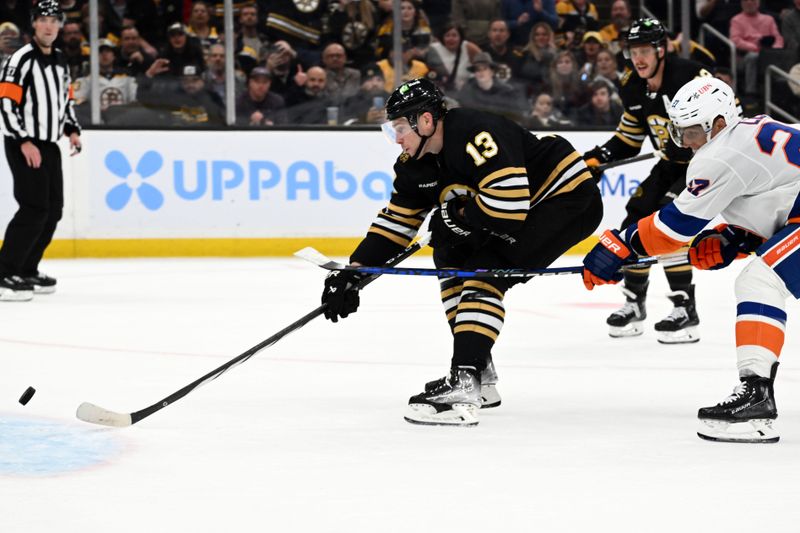 Nov 9, 2023; Boston, Massachusetts, USA; Boston Bruins center Charlie Coyle (13) scores a goal in front of New York Islanders left wing Anders Lee (27) during the third period at the TD Garden. Mandatory Credit: Brian Fluharty-USA TODAY Sports