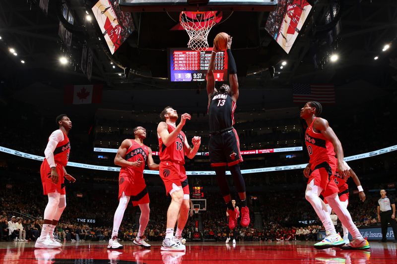 TORONTO, CANADA - DECEMBER 01:  Bam Adebayo #13 of the Miami Heat shoots the ball during the game against the Toronto Raptors on December 1, 2024 at the Scotiabank Arena in Toronto, Ontario, Canada.  NOTE TO USER: User expressly acknowledges and agrees that, by downloading and or using this Photograph, user is consenting to the terms and conditions of the Getty Images License Agreement.  Mandatory Copyright Notice: Copyright 2024 NBAE (Photo by Vaughn Ridley/NBAE via Getty Images)