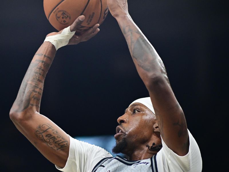 ORLANDO, FLORIDA - NOVEMBER 27: Kentavious Caldwell-Pope #3 of the Orlando Magic shoots a three-point-basket in the first half of a game against the Chicago Bulls at Kia Center on November 27, 2024 in Orlando, Florida. NOTE TO USER: User expressly acknowledges and agrees that, by downloading and or using this photograph, User is consenting to the terms and conditions of the Getty Images License Agreement. (Photo by Julio Aguilar/Getty Images)