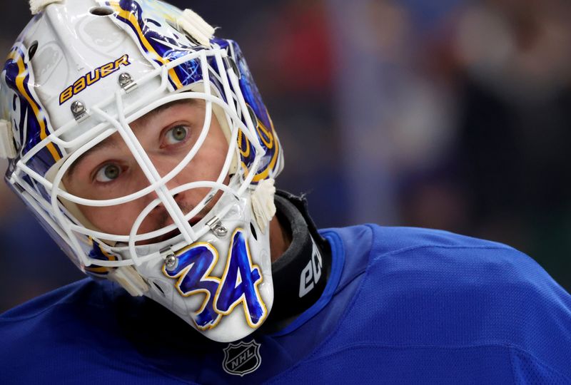 Dec 20, 2025; Buffalo, New York, USA;  Buffalo Sabres goaltender Alex Lyon (34) during a stoppage in play against the New York Islanders at KeyBank Center. Mandatory Credit: Timothy T. Ludwig-Imagn Images