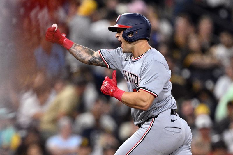 Jun 24, 2024; San Diego, California, USA; Washington Nationals third baseman Nick Senzel (13) celebrates after hitting a two-run home run against the San Diego Padres during the tenth inning at Petco Park. Mandatory Credit: Orlando Ramirez-USA TODAY Sports