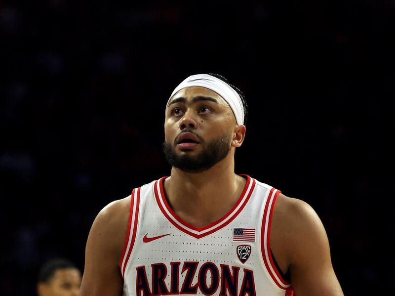 Jan 6, 2024; Tucson, Arizona, USA; Arizona Wildcats guard Kylan Boswell (4) walks back to the bench against the Utah Utes during the first half at McKale Center. Mandatory Credit: Zachary BonDurant-USA TODAY Sports