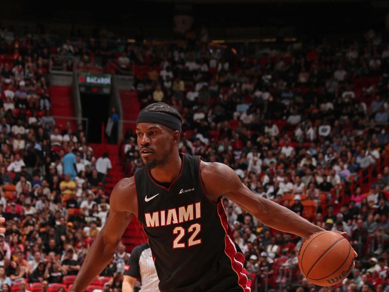 MIAMI, FL - MARCH 2: Jimmy Butler #22 of the Miami Heat handles the ball during the game against the Utah Jazz on March 2, 2024 at Kaseya Center in Miami, Florida. NOTE TO USER: User expressly acknowledges and agrees that, by downloading and or using this Photograph, user is consenting to the terms and conditions of the Getty Images License Agreement. Mandatory Copyright Notice: Copyright 2024 NBAE (Photo by Issac Baldizon/NBAE via Getty Images)