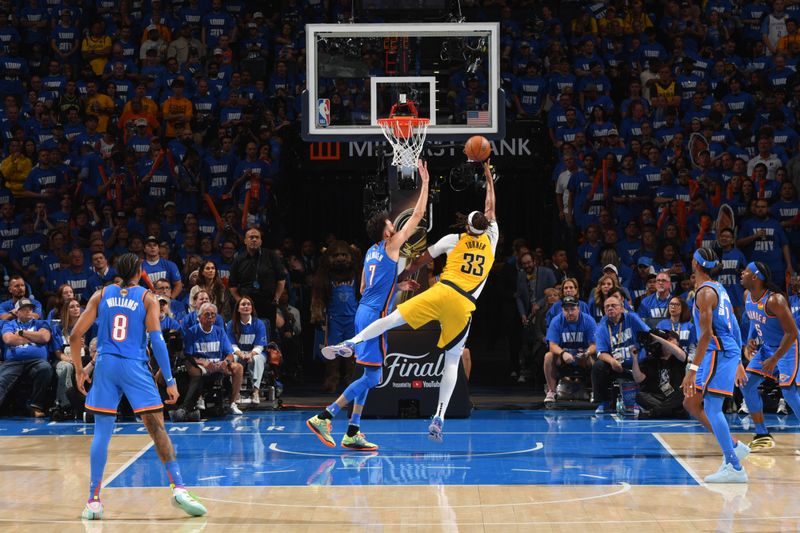 OKLAHOMA CITY, OK - JUNE 8: Myles Turner #33 of the Indiana Pacers drives to the basket during the game against the Oklahoma City Thunder  during Game Two of the 2025 NBA Finals on June 8, 2025 at Paycom Center in Oklahoma City, Oklahoma. NOTE TO USER: User expressly acknowledges and agrees that, by downloading and or using this photograph, User is consenting to the terms and conditions of the Getty Images License Agreement. Mandatory Copyright Notice: Copyright 2025 NBAE (Photo by Jesse D. Garrabrant/NBAE via Getty Images)