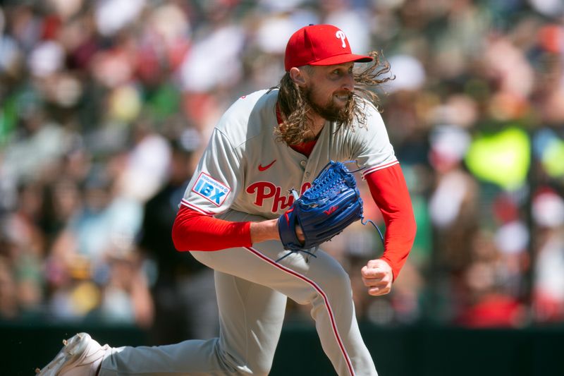 May 25, 2025; West Sacramento, California, USA; Philadelphia Phillies pitcher Matt Strahm (25) delivers a pitch against the Athletics during the ninth inning at Sutter Health Park. Mandatory Credit: D. Ross Cameron-Imagn Images