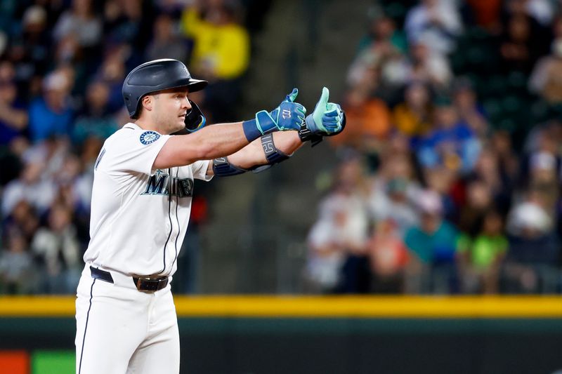 May 31, 2025; Seattle, Washington, USA; Seattle Mariners third baseman Ben Williamson (9) reacts towards the Mariners dugout after hitting a double against the Minnesota Twins during the fifth inning at T-Mobile Park. Mandatory Credit: Joe Nicholson-Imagn Images