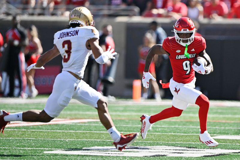 Sep 23, 2023; Louisville, Kentucky, USA;  Louisville Cardinals wide receiver Ahmari Huggins-Bruce (9) runs the ball against Boston College Eagles defensive back Khari Johnson (3)  during the first half at L&N Federal Credit Union Stadium. Louisville defeated Boston College 56-28. Mandatory Credit: Jamie Rhodes-USA TODAY Sports