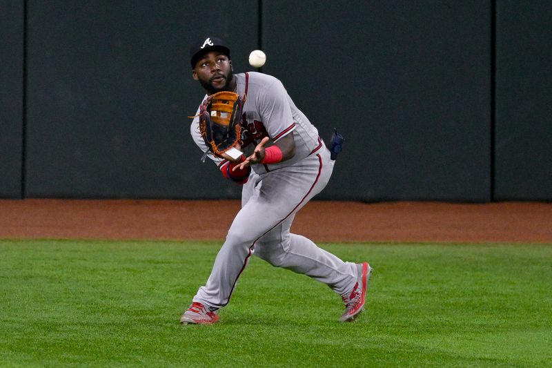 May 16, 2023; Arlington, Texas, USA; Atlanta Braves center fielder Michael Harris II (23) catches a line drive hit by Texas Rangers pinch hitter Josh Smith (47) during the ninth inning at Globe Life Field. Mandatory Credit: Jerome Miron-USA TODAY Sports