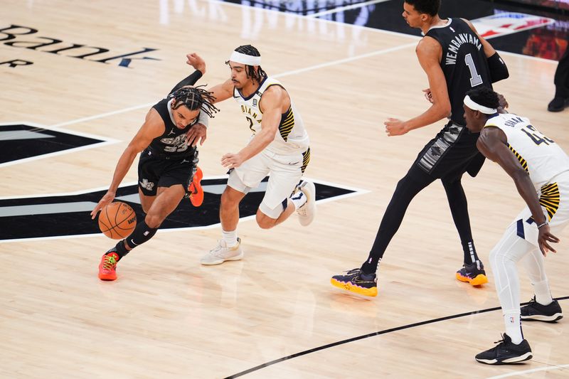 SAN ANTONIO, TX - MARCH 3: Tre Jones #33 of the San Antonio Spurs dribbles the ball during the game Indiana Pacers on March 3, 2024 at the AT&T Center in San Antonio, Texas. NOTE TO USER: User expressly acknowledges and agrees that, by downloading and or using this photograph, user is consenting to the terms and conditions of the Getty Images License Agreement. Mandatory Copyright Notice: Copyright 2024 NBAE (Photos by Cooper Neill/NBAE via Getty Images)