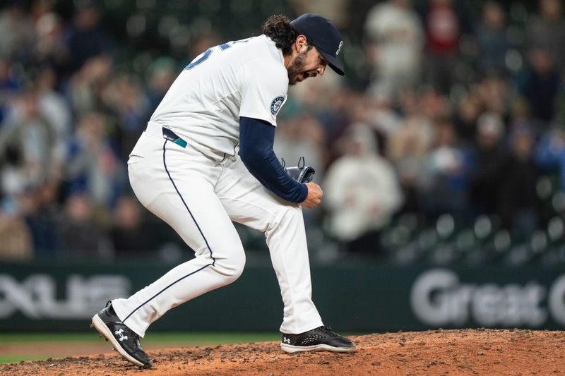 May 13, 2024; Seattle, Washington, USA; Seattle Mariners reliever Andres Munoz (75) celebrates after throwing the final during the ninth inning against the Kansas City Royals at T-Mobile Park. Mandatory Credit: Stephen Brashear-USA TODAY Sports