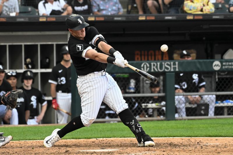 Jul 6, 2023; Chicago, Illinois, USA; Chicago White Sox first baseman Andrew Vaughn (25) hits an RBI single against the Toronto Blue Jays] during the eleventh inning at Guaranteed Rate Field. Mandatory Credit: Matt Marton-USA TODAY Sports