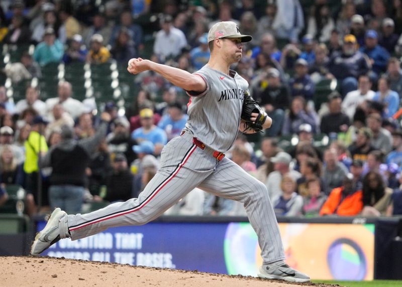 May 18, 2025; Milwaukee, Wisconsin, USA; Minnesota Twins pitcher Justin Topa (48) delivers a pitch against the Milwaukee Brewers in the seventh inning at American Family Field. Mandatory Credit: Michael McLoone-Imagn Images