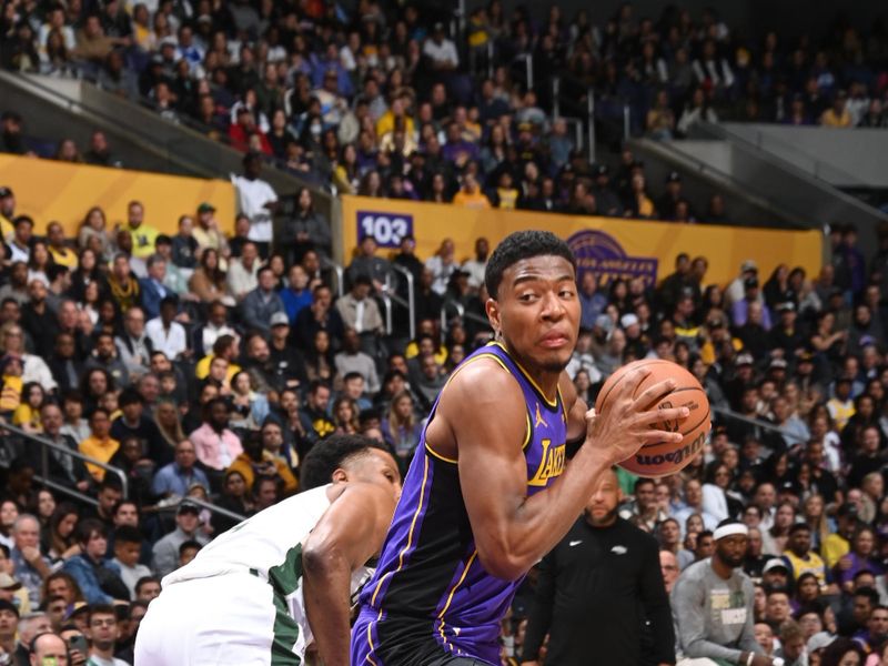 LOS ANGELES, CA - MARCH 8: Rui Hachimura #28 of the Los Angeles Lakers drives to the basket during the game against the Milwaukee Bucks on March 8, 2024 at Crypto.Com Arena in Los Angeles, California. NOTE TO USER: User expressly acknowledges and agrees that, by downloading and/or using this Photograph, user is consenting to the terms and conditions of the Getty Images License Agreement. Mandatory Copyright Notice: Copyright 2024 NBAE (Photo by Andrew D. Bernstein/NBAE via Getty Images)