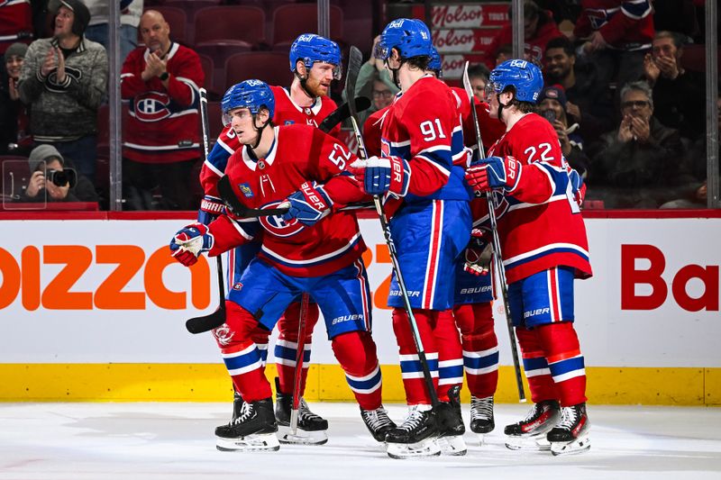 Dec 2, 2023; Montreal, Quebec, CAN; Montreal Canadiens defenseman Justin Barron (52) skates back to the bench after celebrating his goal against the Detroit Red Wings during the first period at Bell Centre. Mandatory Credit: David Kirouac-USA TODAY Sports