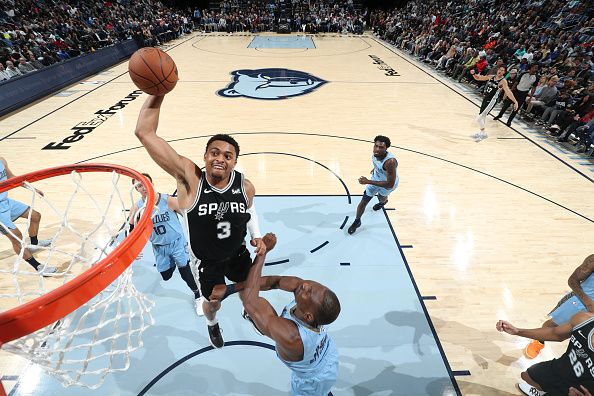 MEMPHIS, TN - JANUARY 2:  Keldon Johnson #3 of the San Antonio Spurs goes to the basket during the game on January 2, 2024 at FedExForum in Memphis, Tennessee. NOTE TO USER: User expressly acknowledges and agrees that, by downloading and or using this photograph, User is consenting to the terms and conditions of the Getty Images License Agreement. Mandatory Copyright Notice: Copyright 2024 NBAE (Photo by Joe Murphy/NBAE via Getty Images)